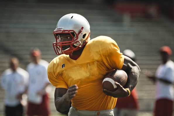 Junior running back Bobby Rainey wears a yellow jersey during Westerns fall camp to signify that he cant be tackled. Rainey ran for 939 rushing yards on just 144 attempts during the Toppers 0-12 campaign last season.