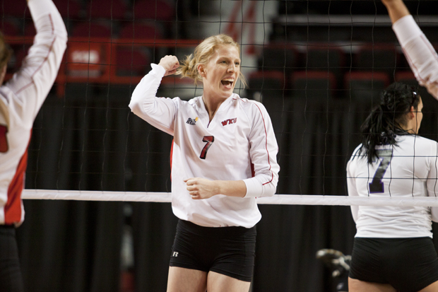 Junior+middle+hitter+Tiffany+Elmore+celebrates+with+her+teammates+after+they+scored+against+the+University+of+Central+Arkansas+in+the+first+set+of+their+match+in+Diddle+Arena+during+the+WKU+Tournament+on+Saturday+night.+The+Toppers+defeated+the+Sugar+Bears+in+three+sets.+CHRIS+FRYER%2FHERALD