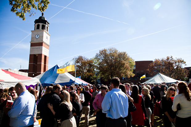 A crowd of tailgaters gathers on South Lawn under the Guthrie Bell Tower before WKUs Homecoming game against North Texas on Saturday.