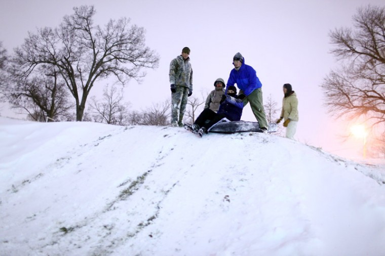 WKU+students+prepare+to+sled+down+Hospital+Hill+on+an+air+mattress+during+Sundays+snow+storm+in+Bowling+Green.