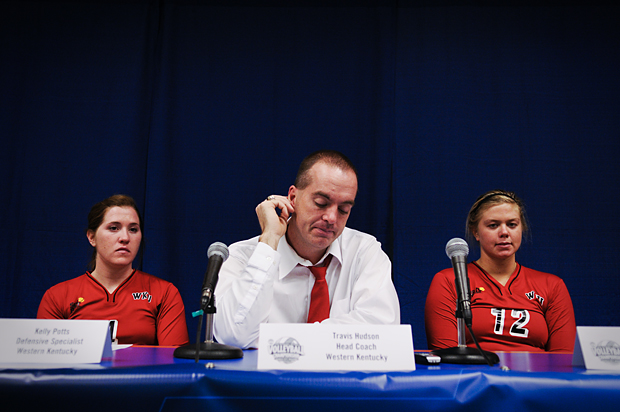 From left, defensive specialist Kelly Potts, Head Coach Travis Hudson and outside hitter Jordyn Skinner speak at a press conference after their 3-0 loss to Cincinnati in the first round of the NCAA tournament.
