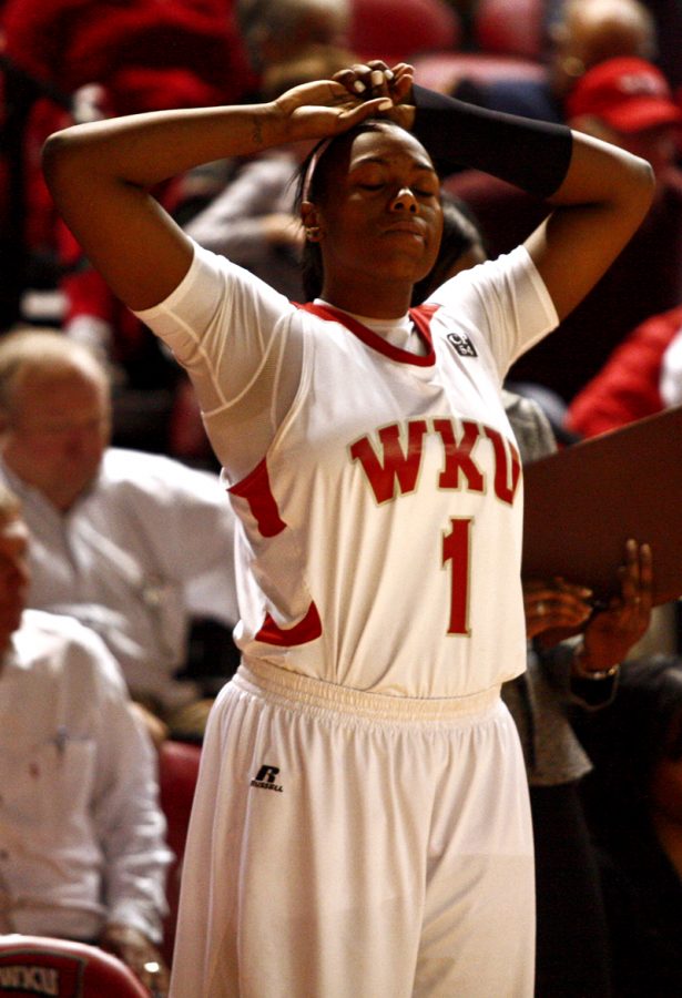 WKU junior forward Keisha Mosley closes her eyes after witnessing senior guard Hope Brown miss the last attempted shot of the game against the Denver Pioneers Wednesday. The Lady Toppers lost 51-50 in Diddle Arena.