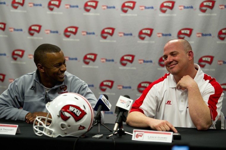 WKU Head coach Willie Taggart (left) and new defensive coordinator Lance Guidry discuss the past and the future of WKU football in a press conference Friday. The announcement officially introduced Guidry as the Toppers new DC.