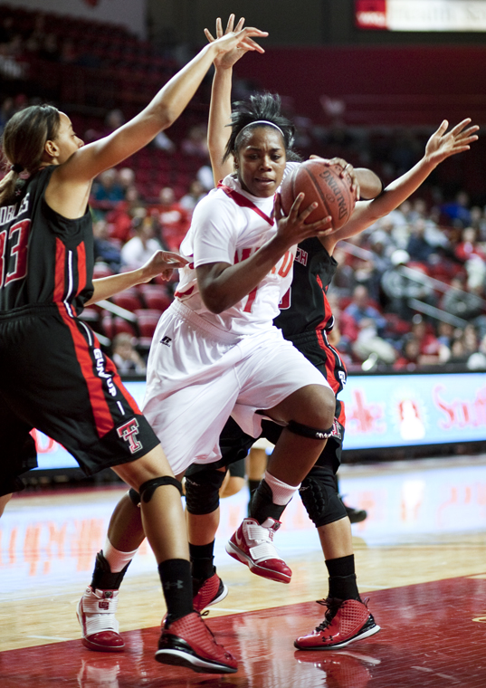 Junior Keisha Mosley fights off multiple defenders during a Dec. 29 game against Texas Tech. Mosley and the Lady Toppers lost to both Florida International and Florida Atlantic last week, falling to 8-13.