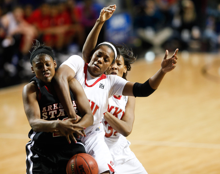 Keisha Mosley fights for a rebound during the second half of Mondays game against Arkansas State. Mosley had 11 rebounds during the game, a career high.