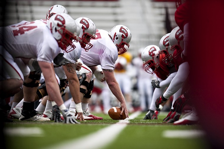 WKU football players line up for a play during practice at Houchens-Smith Stadium earlier this spring. The Toppers will host their annual spring game Saturday at 5 p.m.