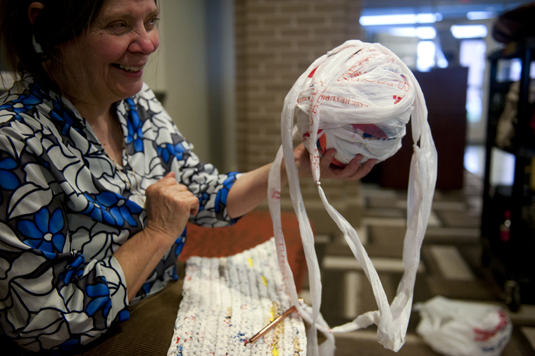 WKU+faculty+member+Beverly+Fulkerson+holds+up+a+ball+of+plastic+yarn+made+from+shopping+bags+that+she+is+crocheting+into+a+sleeping+mat+intended+to+be+given+to+a+homeless+person+in+the+community.+%C2%A0Fulkerson+is+just+one+of+the+hundreds+of+local+volunteers+who+have+worked+on+the+project+organized+by+Community+Action.%C2%A0+The+project+is+spreading%2C+Fulkerson+said.%C2%A0+Whether+you+make+the+yarn+or+crochet+the+mat%2C+people+just+want+to+be+involved+in+helping+someone+in+need.+DANNY+GUY%2FHERALD