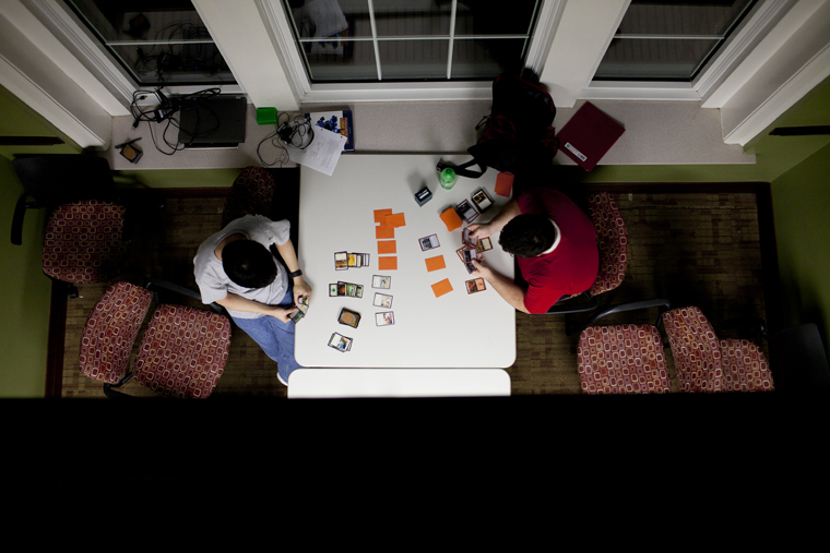 Logan Eckler of Covington, right, and Austin Tang of Bowling Green play a game of Magic: the Gathering on Sunday on the third floor of Florence Schneider Hall, the home of the Gatton Academy.
