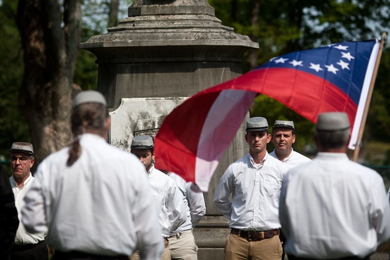 Volunteers from the local community conduct a memorial on
Saturday at the Confederate Monument in Fairview Cemetery for
unknown soldiers that died during the Civil War on the 150th
anniversary of Maj. Gen. Simon Bolivar Buckner’s invasion of
Bowling Green.
