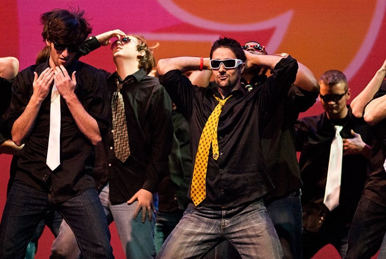 (Left to right) Phil Korba, Riad Otoum and the Sigma Nu
fraternity perform a dance routine in competition for the top
performance prize at Kappa Deltas I Love the 90s themed
Shenanigans. The event was organized to Prevent Child Abuse, with
80 percent of proceeds going to Bowling Greens Family Enrichment
Center and 20 percent to Prevent Child Abuse America. Sigma Nu won
first place at the end of the night.

