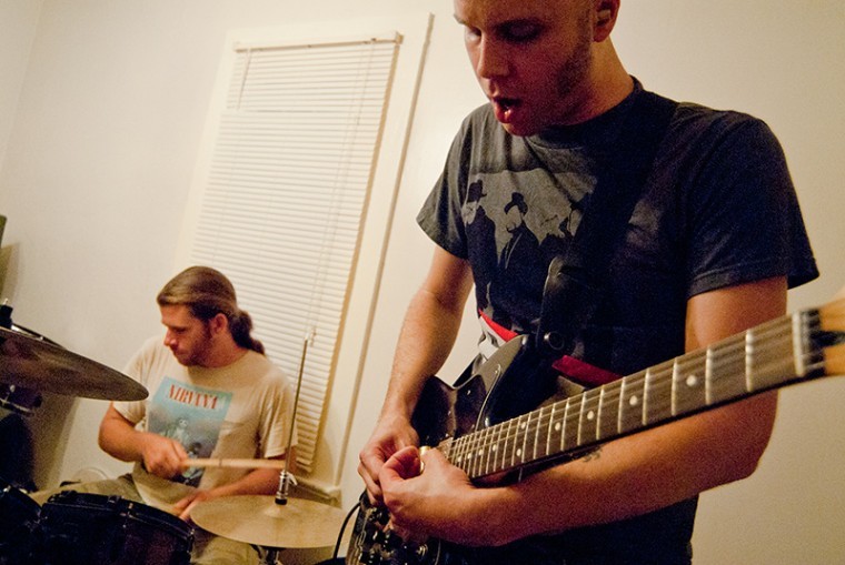 Drummer Daniel Marlowe and guitarist J.D. Minor rehearse with
their band, Schools, for an upcoming gig.
