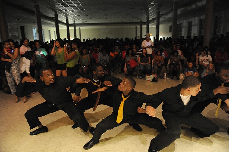 Alpha Phi Alpha brothers dance after performing in
the Skee-Phi Yard Show in the Garrett Ballroom on Sept. 9. The yard
show serves as a preview to the Homecoming step show.

