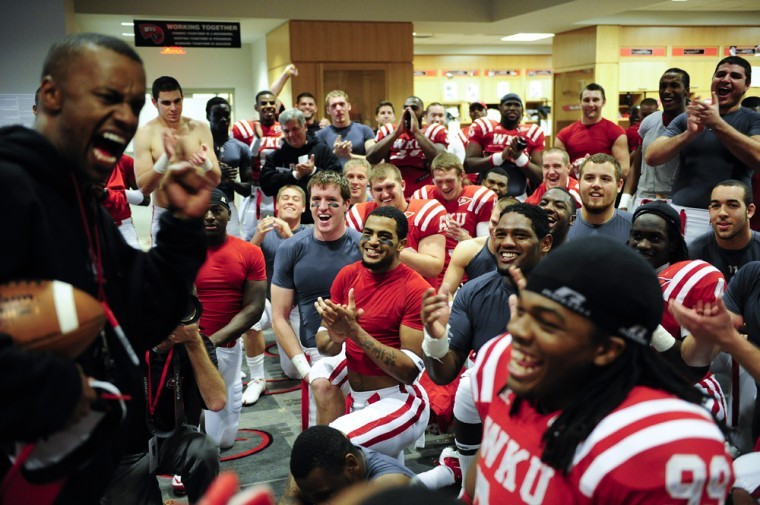WKU+players+an+coaches+celebrate+in+the+locker+room+Saturday%0Aafter+WKUs+41-18+win+over+Troy.%0A