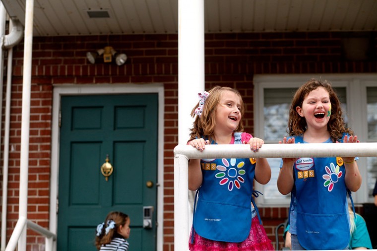 Two Bowling Green Girl Scouts, Meredith Rosser (left), and Lili
Garmon sing and dance to music during the Confidence Carnival that
the Kappa Delta Sorority hosted for local Girl Scouts at the KD
house on Sunday.
