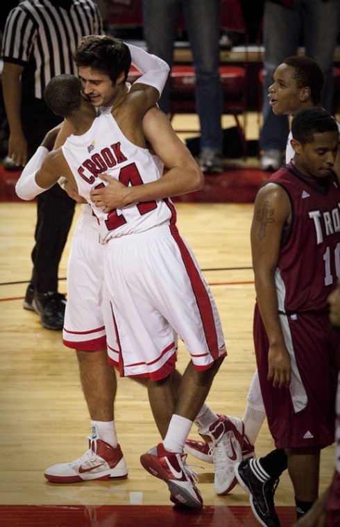 Junior guard Jamal Crook hugs freshman forward Vinny Zollo after
Zollo scored while being fouled during the second half of WKUs
game against Troy Saturday in Diddle Arena. WKU lost the game
67-65.
