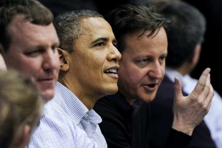 United States President Barack Obama talks with British Prime Minister David Cameron during WKUs NCAA Tournament First Round game in Dayton, Ohio on March 13. Stephen Lancaster, a WKU faculty member, sat near the two leaders during the game.
