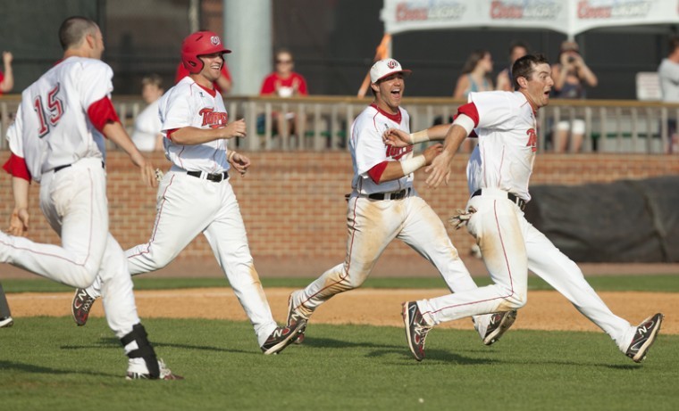 WKU players run onto the field after their 8-7 victory over UALR Sunday at Nick Denes Field. WKU lost to UALR Friday but came back to win the other two games of the series.
