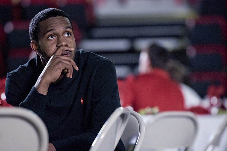 WKU senior guard Kahlil McDonald watches the highlight reel during Thursday nights basketball banquet at Diddle Arena. The lone senior on this years team, McDonald took home two awards — the Darel Carrier Free Throw Accuracy Award and the John Oldham Most Improved Player Award.
