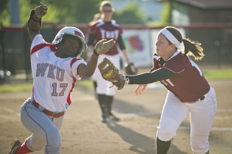 WKU sophomore infielder Olivia Watkins barely misses a tag during a game against Troy on Friday at the WKU Softball Complex. WKU lost the game 9-1 before winning the last two games of the series.
