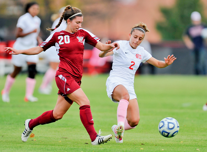 WKU junior Andrea Curry fights for possession against Troy.

