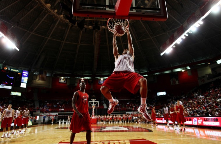 Junior guard Jay Starks dunks during warmups for Hilltopper
Hysteria on Friday night in Diddle Arena. 
