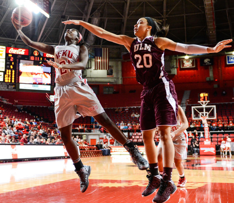 Sophomore+guard+Alexis+Govan+jumps+for+a+rebound+during+the+WKU+vs+ULM+game+at+Diddle+Arena+in+Bowling+Green%2C+Ky.+on+Wednesday+February+20.%0A