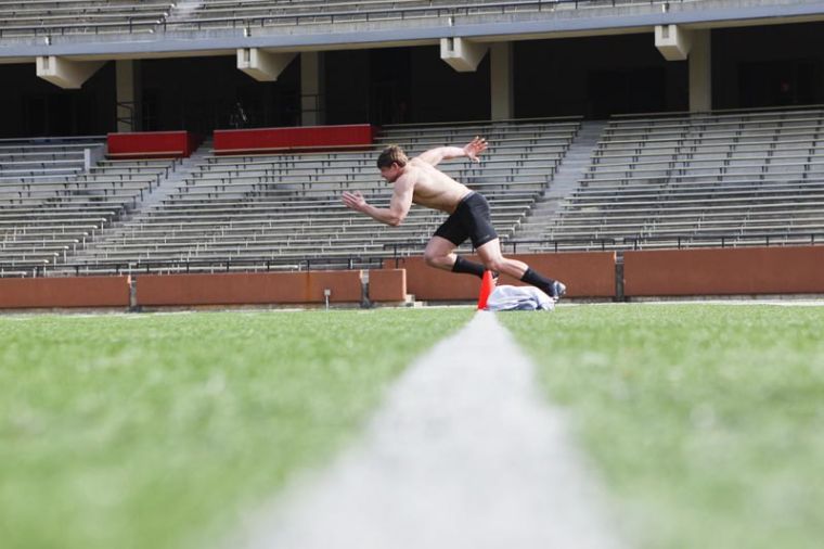 Senior+tight+end+Ryan+Wallace+gets+in+his+sprinters+stance+before+doing+the+40-yard+dash+during+WKUs+Pro+Day+on+Wednesday+at+Smith+Stadium.+Pro+Day+gave+senior+athletes+a+chance+to+show+off+their+skills+to+NFL+scouts+to+attempt+to+earn+a+spot+on+an+NFL+Roster.%0A