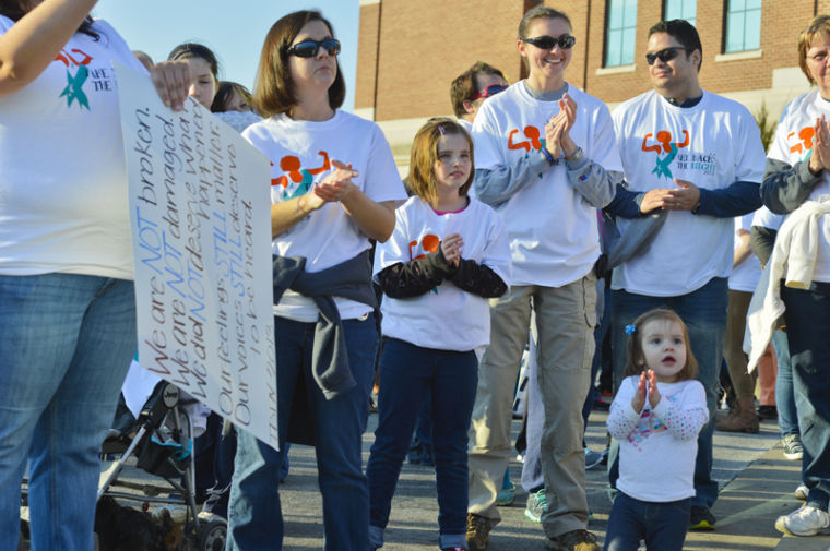 Members of the community gathered at the Justice Center to support Hope Harbor and promote awareness of sexual assault during the annual Take Back the Night March, 28, 2013.
