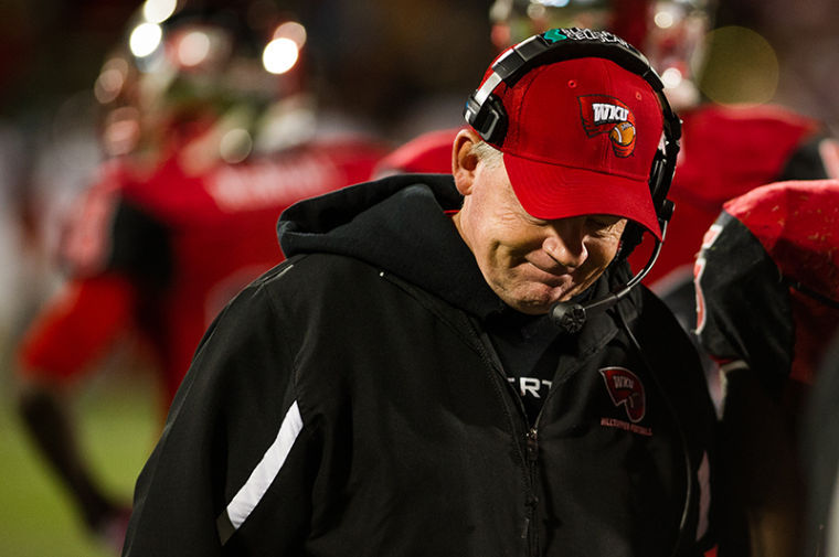 Western Kentucky University coach Bobby Petrino reacts after losing a challenge to maintain possession with less than two minutes left in the game. Western would go on to lose 32-26 at home on Saturday, October 26, 2013. 