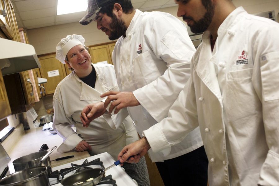 WKU professor Julie Lee assists Brazil freshman Bruno De Sousa (left) and Louisville sophomore Bruce Hunt (right) in her food science class on Tuesday, Feb. 18. Lee has been teaching at WKU for eight years and previously worked as a chef. Ive always wanted to teach and Ive always wanted to be a chef, Lee said. I cant believe I have been here so long, I have never worked anywhere this long before. (Dorothy Edwards / Herald)