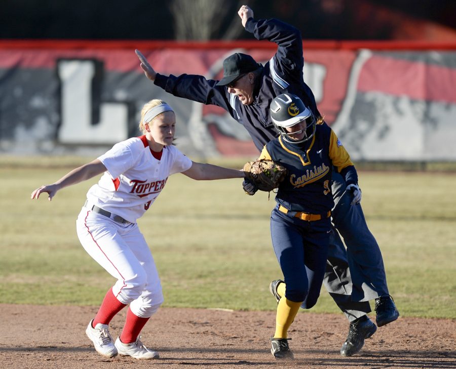 WKU senior infielder Amanda Thomas tags Canisius senior infielder Valorie Nappo as she attempted to steal the base in WKUs win of 8-1 against Canisius on Friday Feb. 21, 2014 at the WKU softball complex in Bowling Green, Ky. (Jeff Brown/HERALD)