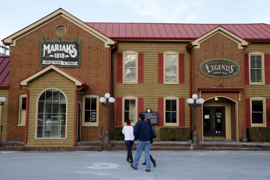 A family walks into Mariahs on Friday, Feb. 7. The restaurant occupied the Mariah Moore House, the oldest standing brick structure in Bowling Green, but new ownership decided to move the business to a new location in Hitcents Park Plaza. (Kreable Young/HERALD)
