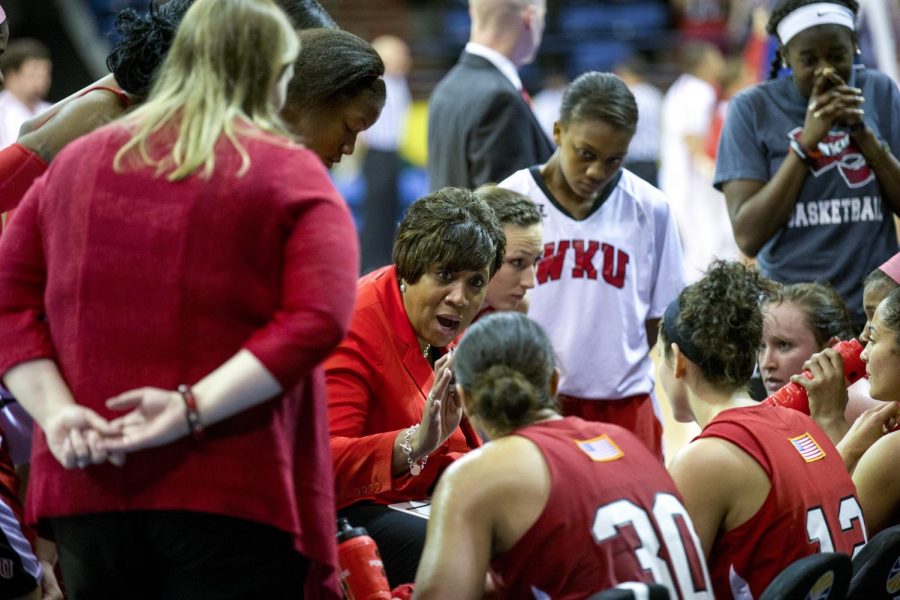 WKUs head coach Michelle Clark-Heard speaks to the Lady Toppers during a timeout in the final minutes of their 61-60 victory over Arkansas State in the championship game of the Sun Belt Tournament Saturday, March 15, 2014, at Lakefront Arena in New Orleans, La. The Lady Toppers secured a place in the NCAA tournament with their win. (Mike Clark/HERALD)