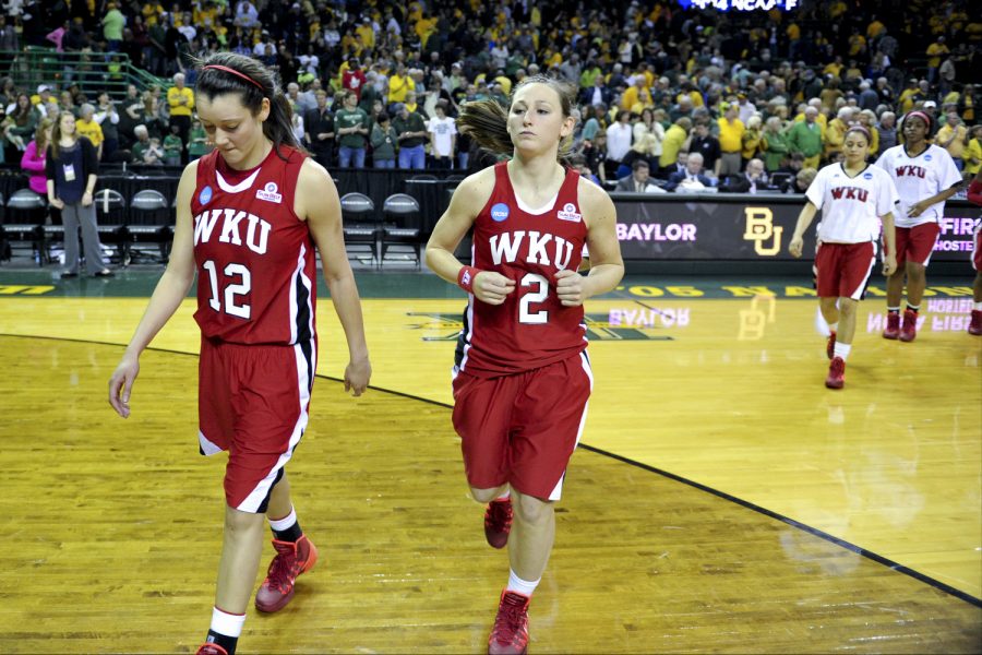 WKU freshman guard Kendall Noble and senior guard Chaney Means walk back to the locker room after their 87-74 loss to Baylor during the first round of the 2014 NCAA Divison I Womens Basketball Championship at the Ferrell Center in Waco, Texas on Saturday March 22, 2014. (Jeff Brown/HERALD)