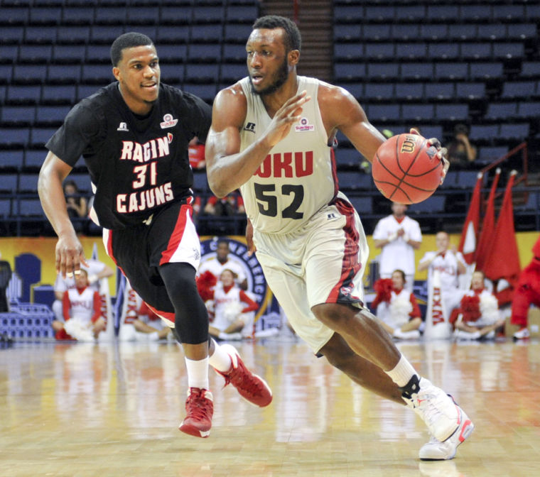 WKU junior guard T.J. Price drives the ball pass ULL junior guard Kevin Brown during the 2014 Mens Sun Belt Tournament semifinal round at the Lakefront Arena in New Orleans, La. on Saturday Mar. 15, 2014. (Jeff Brown/HERALD)