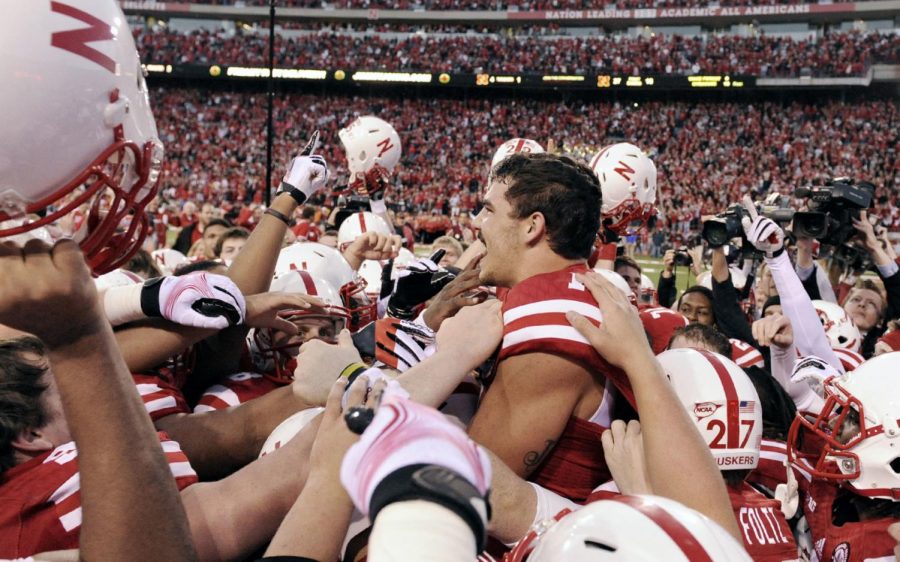 Nebraska wide receiver Jordan Westerkamp (1) and the rest of the Huskers celebrate their 27-24 victory on a Hail Mary against Northwestern at Memorial Stadium on Nov. 2, 2013.