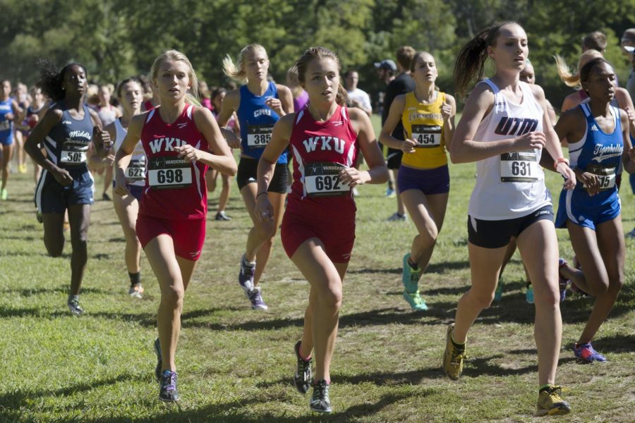 WKU+sophomore+cross+country+runners+Baylee+Shofner+and+Taylor+Carlin+compete+in+the+Vanderbilt+Commodore+Classic+on+Sept.+14%2C+2013.+Luke+Franke%2FHERALD
