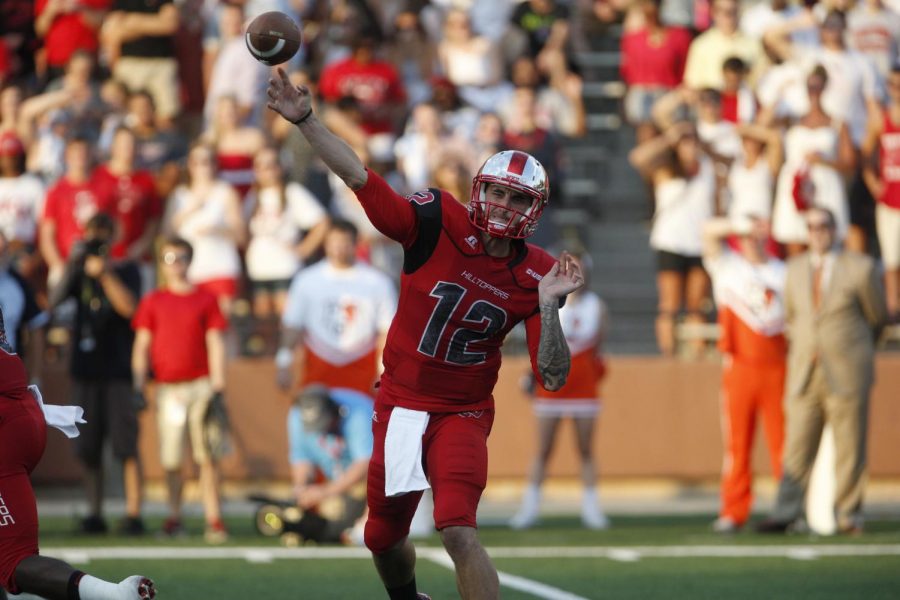Redshirt senior quarterback Brandon Doughty passes the ball during the first half of WKUs game against Bowling Green State Friday, Aug. 29, 2014, at Houchens Industries - L.T. Smith Stadium in Bowling Green, Ky. Mike Clark/HERALD