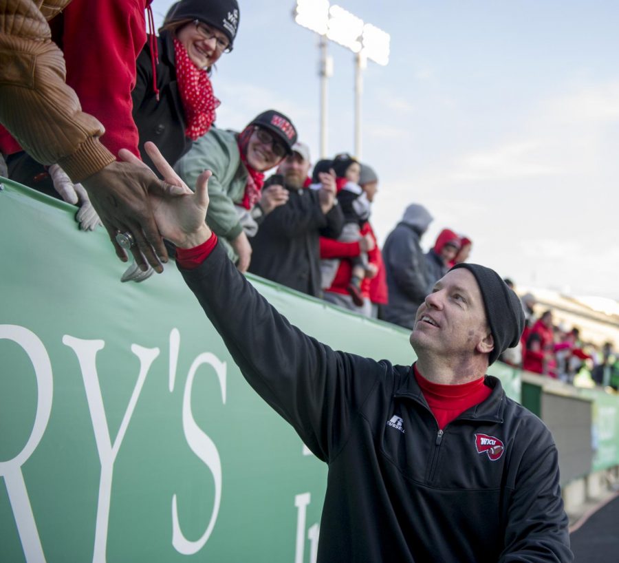 Hilltoppers head coach Jeff Brohm greets fans after Fridays game in Huntington, West Virginia. Nick Wagner/HERALD