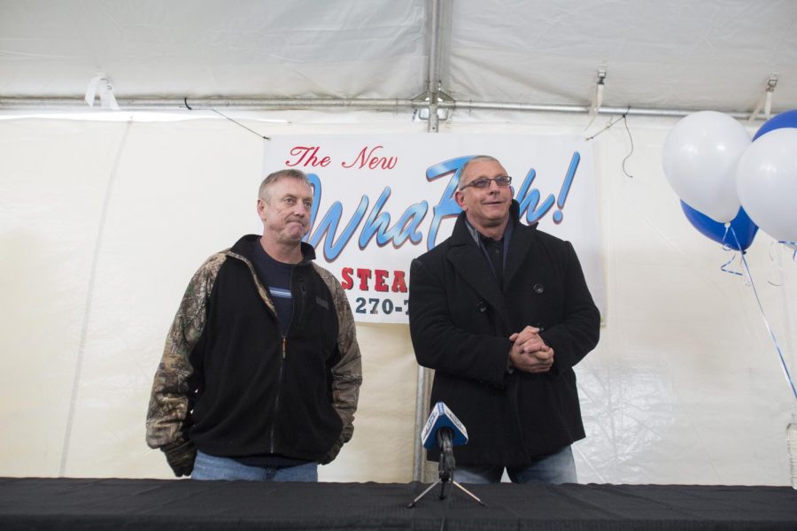 Donnie Perky Perruquet (left), owner of Wha Bahs Steakhouse in Bowing Green, Ky stands next to Food Networks Robert Irvine, host of the popular television show Restaurant: Impossible Tuesday January 13th, 2015 during a press conference held for the media. Perruquet has owned the restaurant since 2006 and is hoping that Roberts transformation of the Steakhouse will turn his fortunes around. The grand opening of the store was held at 7pm Tuesday and is now officially open to the public. (Luke Franke/WKU Herald)
