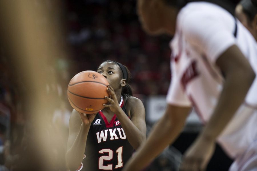 Senior Guard/Forward Alexis Govan, of San Antonio, Texas, takes a free throw in the Lady Toppers game against the University of Louisville at the Yum! Center, November 25, 2014. Justin Gilliland/HERALD