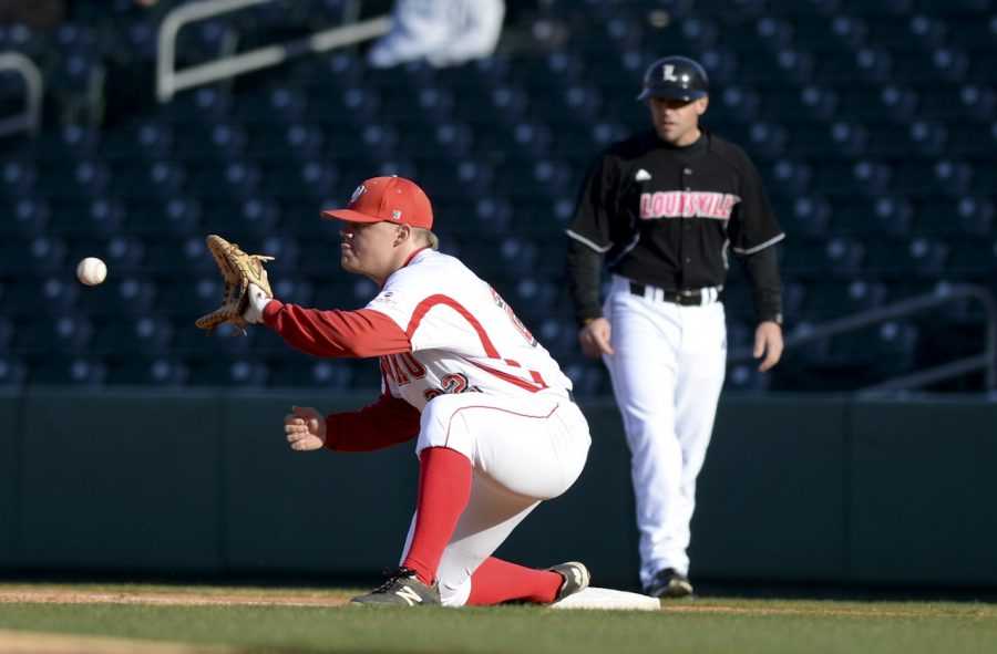 WKU+junior+infielder+Ryan+Church+catches+the+ball+to+get+Louisville+infielder+Sutton+Whiting+during+WKUs+5-3+lost+against+Louisville+at+the+Bowling+Green+Ballpark+in+Bowling+Green%2C+Ky+on+Wednesday+March+26%2C+2014.+%28Jeff+Brown%2FHERALD%29