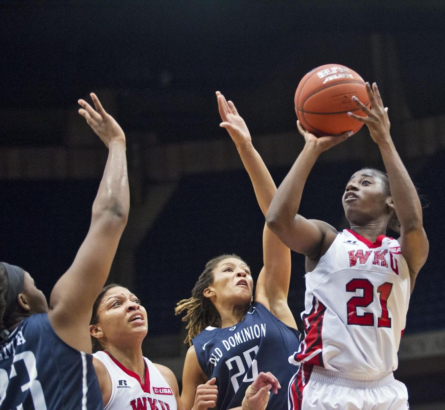 WKU senior guard Alexis Govan (21) shoots a contested jumper during the teams Conference USA tournament semifinal matchup against Old Dominion University Friday March 13, 2015 at Legacy Arena in Birmingham, Ala. Despite leading by 22 points early in the first half the game became closely contested in the final seconds. WKU would go on to win 61-52 and advance to the Championship game tomorrow Saturday March 14 against Southern Mississippi University. Luke Franke/HERALD
