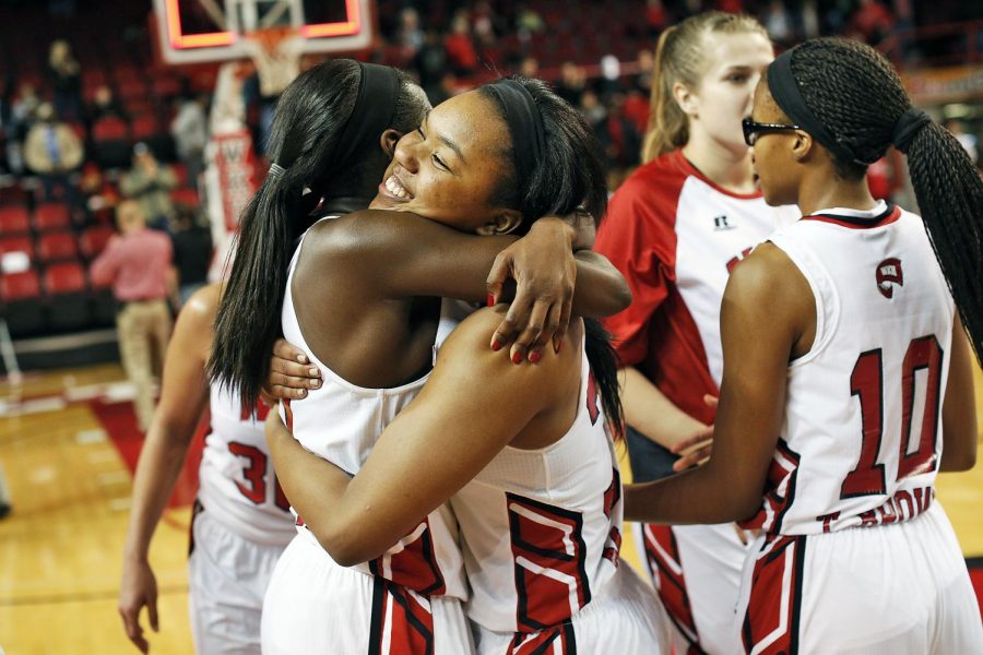 WKU teammates Alexis Govan and Jalynn McClain share an embrace after defeating Conference USA opponent MTSU by a score of 63-60. Placing them at the top of the current Conference USA standings. (Luke Franke/Herald)