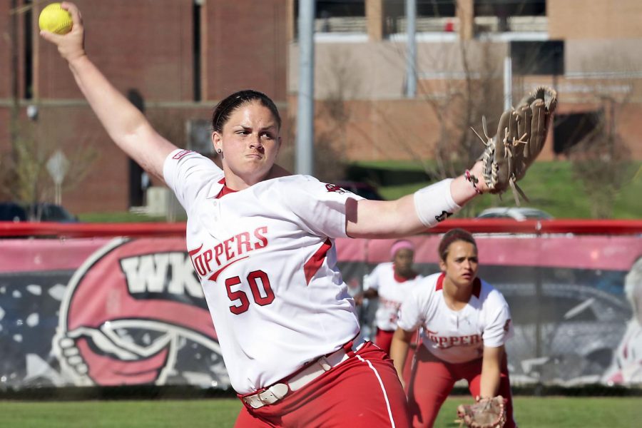 Cartersville, Ga., Lady Topper softball senior pitcher, Janna Scheff, winds up on the pitching mound during the softball double header against Florida Atlantic at the Softball Complex, Saturday, April 4, 2015 . Leanora Benkato/ HERALD