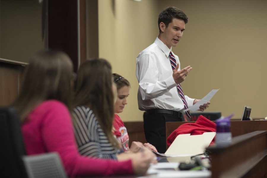 Jay Todd Richey addresses fellow Student Government Association members on Thursday, April 16, 2015, during a special hearing to finalize the decision on controversies over the 2015 presidential election. Anonymous accusations accused Richey of disobeying SGA election codes by placing posters in prohibited locations on campus. The SGA judicial council warned Richey against violating election codes in the future and stated he rightfully won the election. WILLIAM KOLB/HERALD
