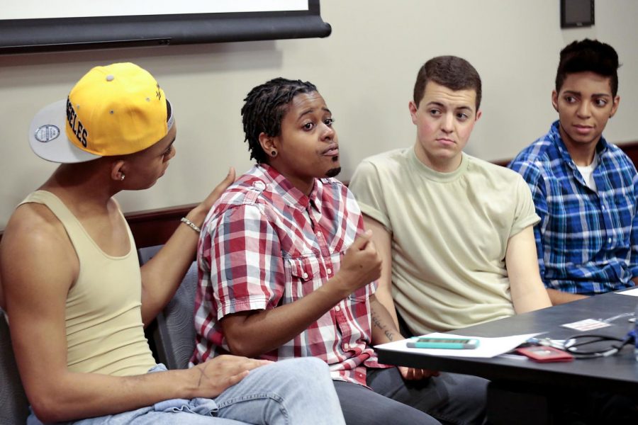 Nashville alum (second from left) Simone Lampkin 13, presenting as male-impersonator as Sammie Luvv, speaks about reconciling religion and personal faith with an LGBTQIA lifestyle during a Gender & Communication Conference panel on trans* and drag identities. Lampkin was joined on the panel by sophomore (from left) London Chandler of Louisville, junior Jared Johnson of Somerset (second from right) and junior Lexus Miller (right) of Lexington. WKU HRL hosted their fifth annual Gender & Communication Conference in DSU on Saturday, April 25, 2015.