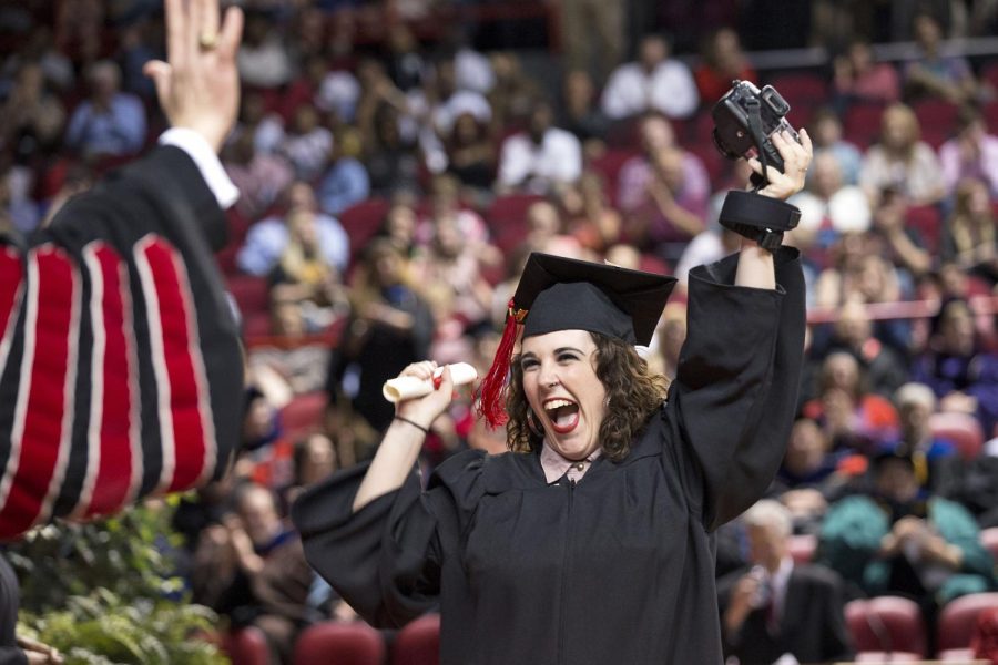 Lexington alum Dorothy Edwards reacts as the crowd cheers for her because she is the last graduate to receive their diploma during the commencement ceremony for WKUs University College and Potter College of Arts and Letters Saturday May 16, 2015, at E.A. Diddle Arena in Bowling Green, Ky.
