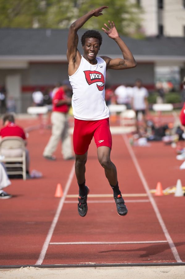 Ventavius Sears leaps toward the sand pit during the triple jump competition in the Hilltopper Relays Saturday at the Charles M. Ruter Track and Field Complex in Bowling Green. Sears took first with a personal-record jump of 51-feet-6.5 inches. Nick Wagner/HERALD