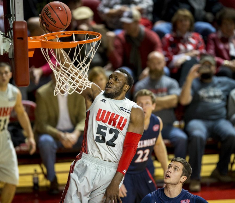 Senior guard T.J. Price (52) makes a layup during WKUs 63-64 loss against Belmont Saturday, Nov. 22, 2014, at E.A. Diddle Arena in Bowling Green, Ky. Price played all 40 minutes of the game and scored 15 points. Mike Clark/HERALD